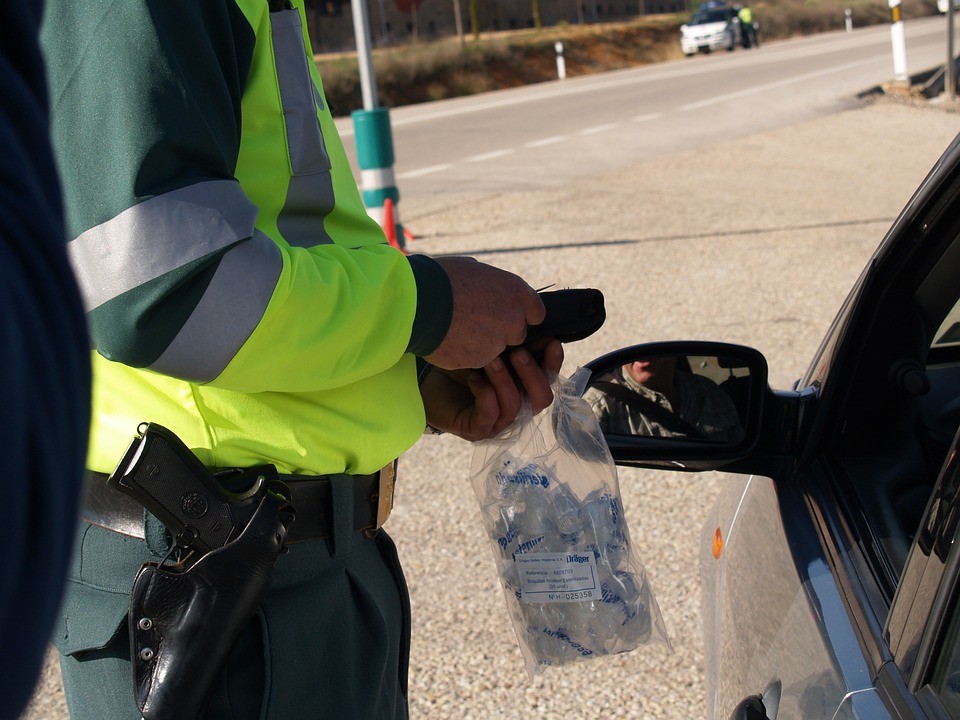 an officer trying to give a driver a breathalyzer test