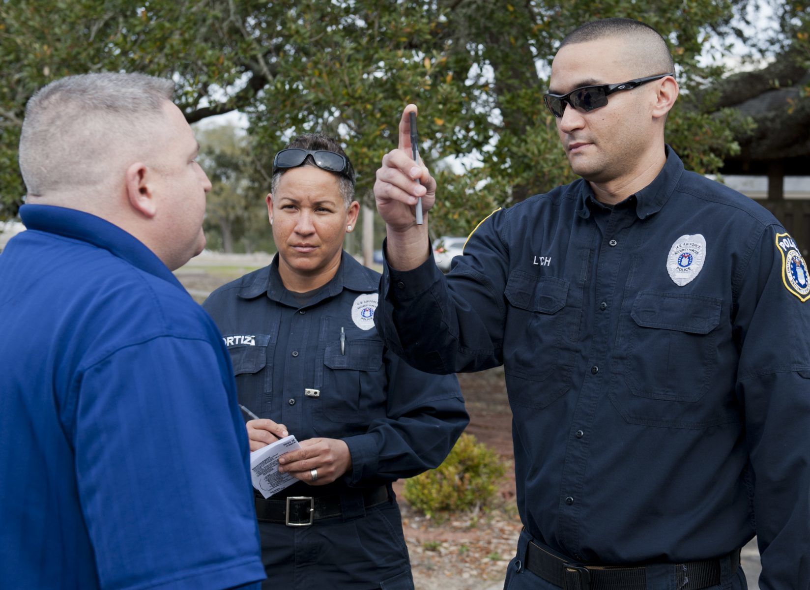 a middle aged man performing a field sobriety test